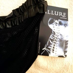 Leather Trim Fishnet Strapless Bodysuit.